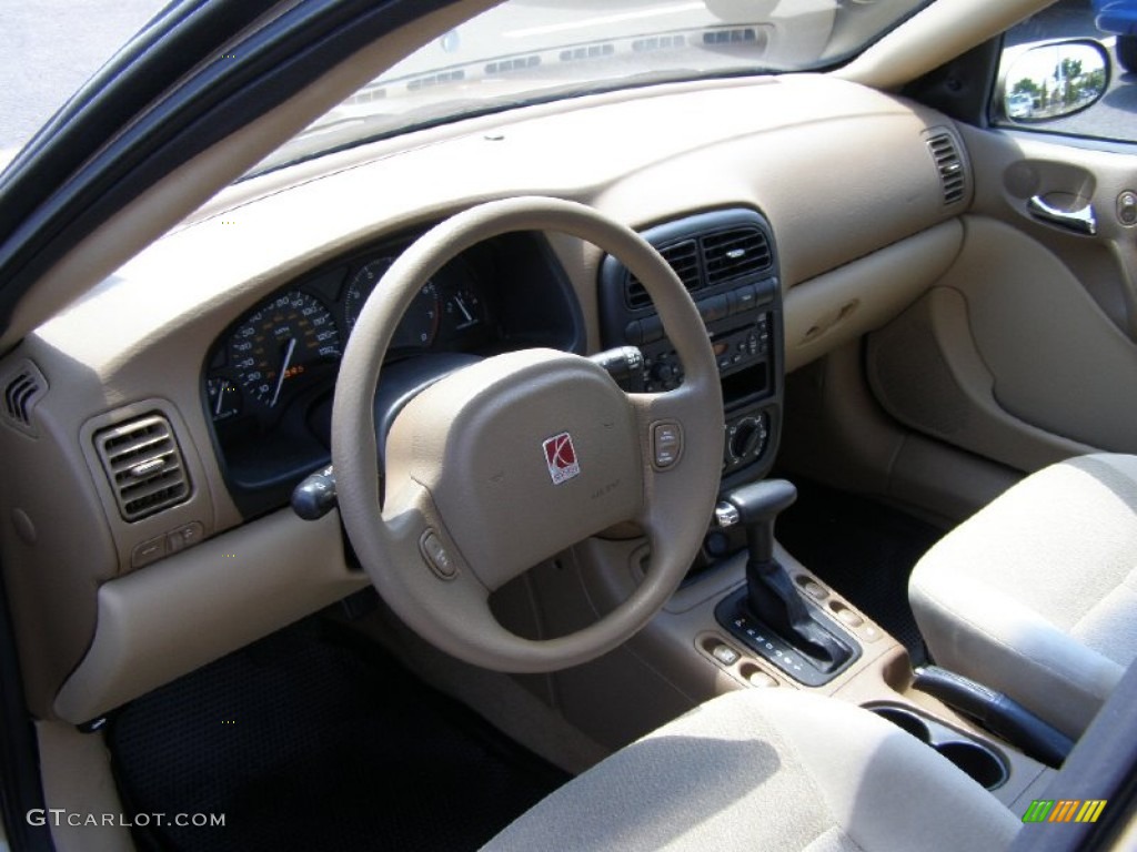 2002 L Series L100 Sedan - Medium Gold / Medium Tan photo #8