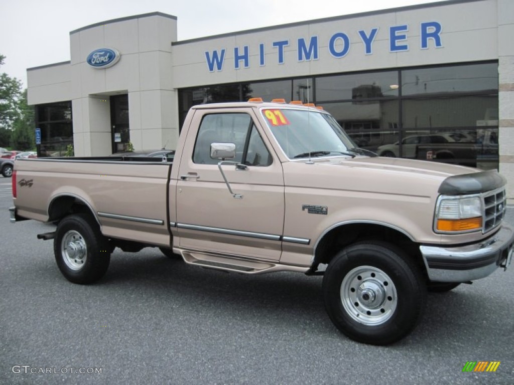 1997 F250 XLT Regular Cab 4x4 - Light Prairie Tan Metallic / Prairie Tan photo #1