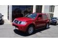 2010 Red Brick Nissan Pathfinder LE 4x4  photo #1