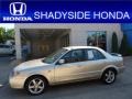 2003 Shimmering Sand Metallic Mazda Protege LX #51188844
