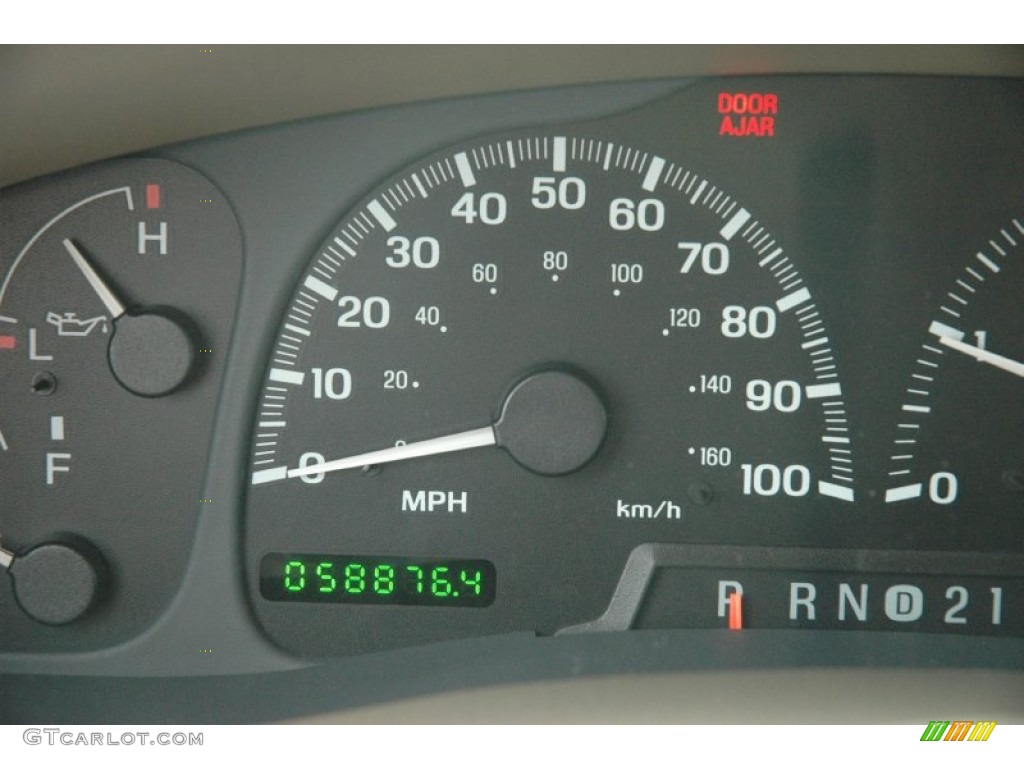 2000 Navigator 4x4 - Laser Red Tinted Metallic / Medium Parchment photo #10