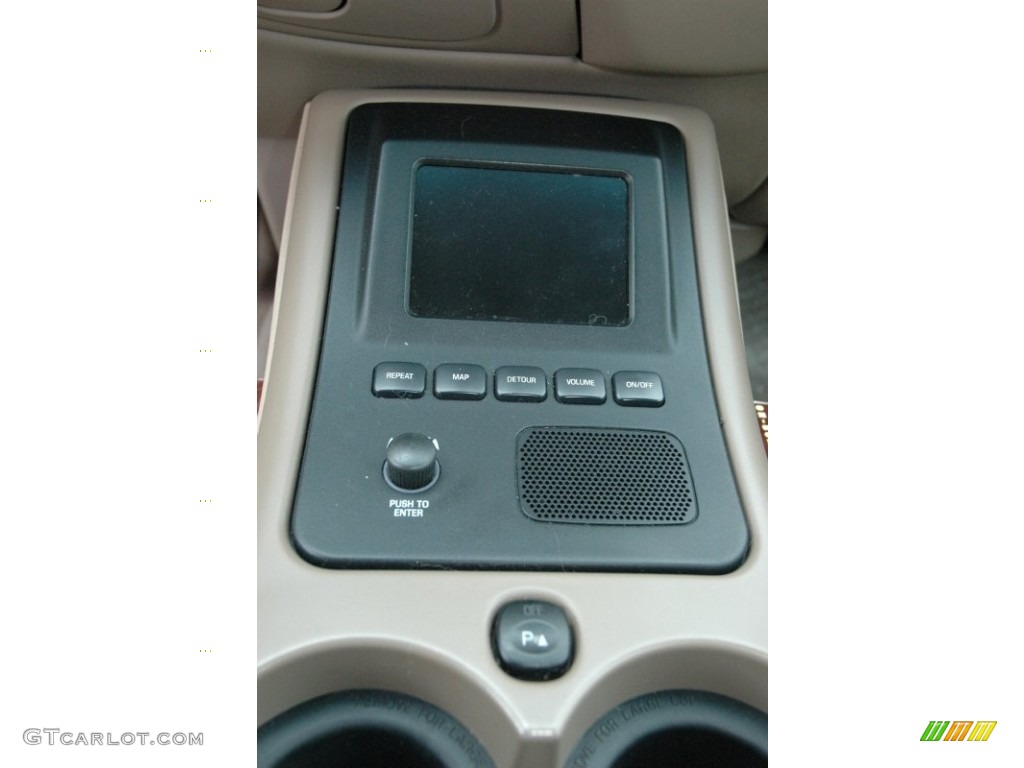 2000 Navigator 4x4 - Laser Red Tinted Metallic / Medium Parchment photo #14