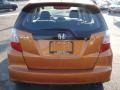 2009 Orange Revolution Metallic Honda Fit Sport  photo #3