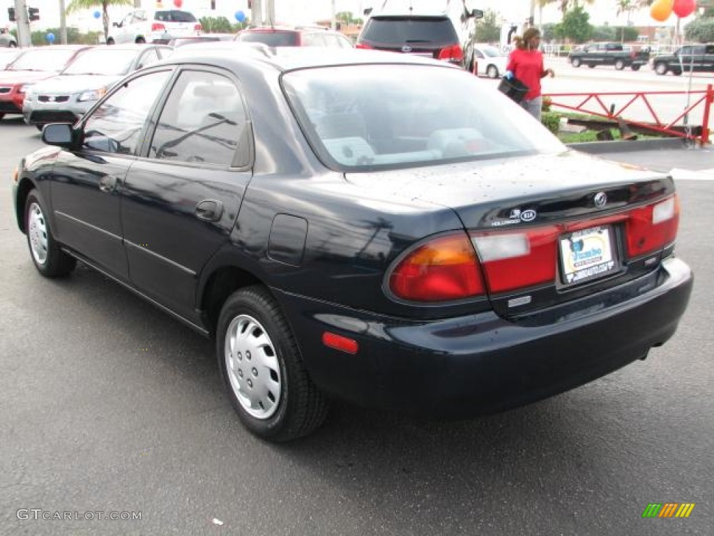 1997 Protege LX - Brilliant Black / Beige photo #7