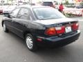 1997 Brilliant Black Mazda Protege LX  photo #7