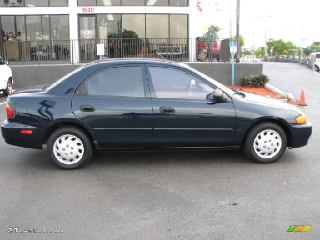 1997 Protege LX - Brilliant Black / Beige photo #10