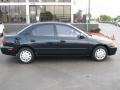 1997 Brilliant Black Mazda Protege LX  photo #10