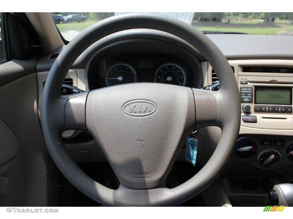 2009 Kia Rio LX Sedan Beige Steering Wheel Photo #51276334