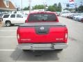 2009 Red Alert Nissan Frontier SE Crew Cab 4x4  photo #4