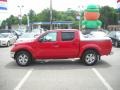 2009 Red Alert Nissan Frontier SE Crew Cab 4x4  photo #6