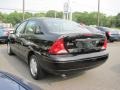 2004 Pitch Black Ford Focus LX Sedan  photo #2