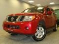 2010 Red Brick Nissan Pathfinder SE 4x4  photo #1