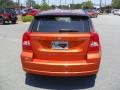 2011 Mango Tango Pearl Dodge Caliber Mainstreet  photo #3