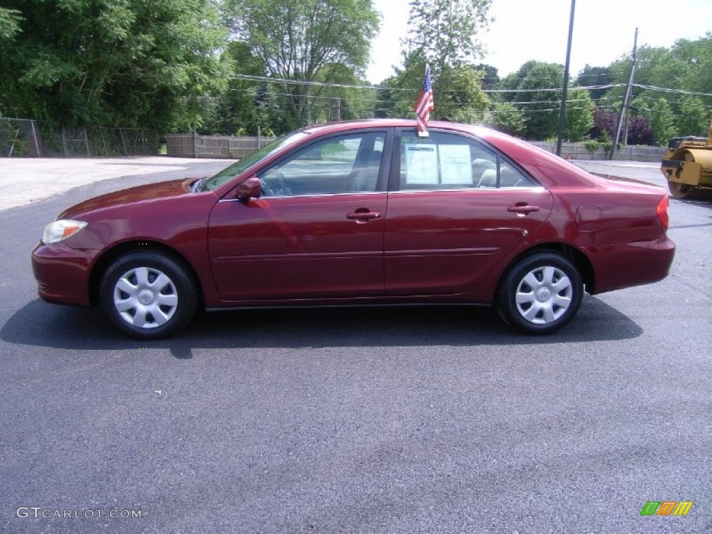 2004 Camry LE - Salsa Red Pearl / Taupe photo #26
