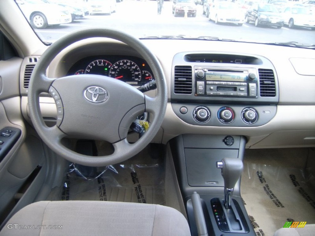 2005 Toyota Camry LE V6 Taupe Dashboard Photo #51371909