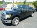 2009 Black Ford F150 XLT SuperCab 4x4  photo #5