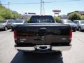 2002 Black Ford F150 XLT SuperCab 4x4  photo #4