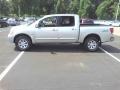 2004 Radiant Silver Nissan Titan LE Crew Cab 4x4  photo #18