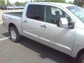 2004 Radiant Silver Nissan Titan LE Crew Cab 4x4  photo #21