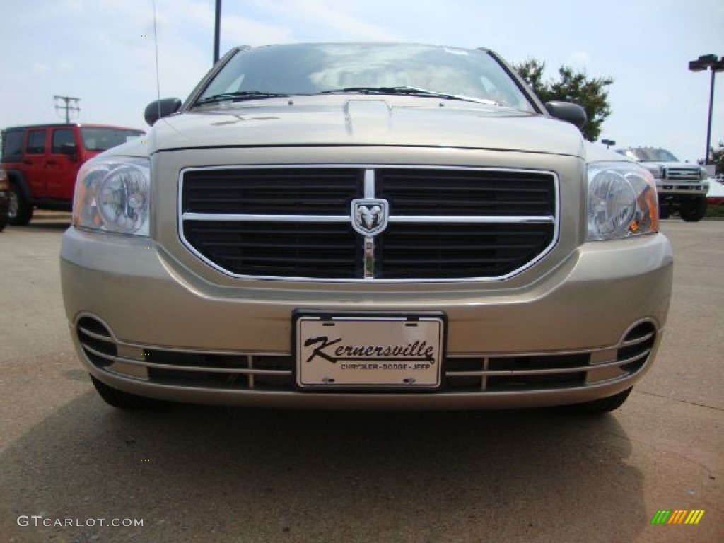 2010 Caliber SXT - Light Sandstone Metallic / Dark Slate Gray/Medium Graystone photo #8