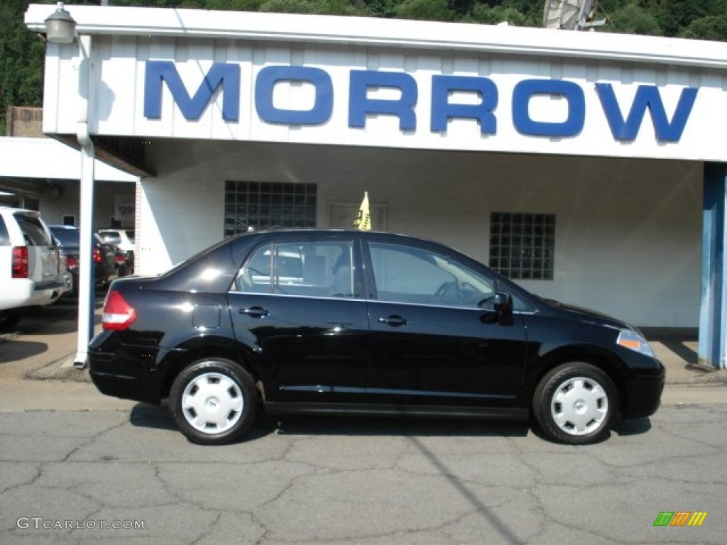 2009 Versa 1.8 S Sedan - Super Black / Charcoal photo #1