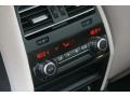 Oyster/Black Controls Photo for 2012 BMW 7 Series #51470784