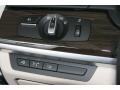 Oyster/Black Controls Photo for 2012 BMW 7 Series #51470871