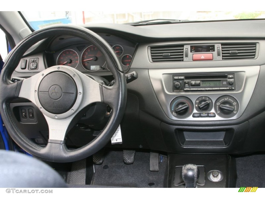 2003 Mitsubishi Lancer Evolution VIII Black/Blue Dashboard Photo #51476712
