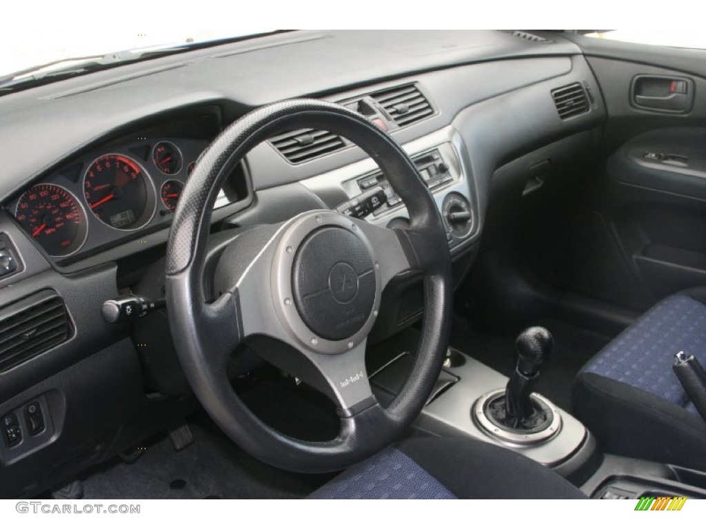 2003 Mitsubishi Lancer Evolution VIII Black/Blue Dashboard Photo #51476718