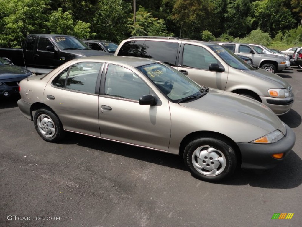 1996 Cavalier Sedan - Sandrift Metallic / Beige photo #7