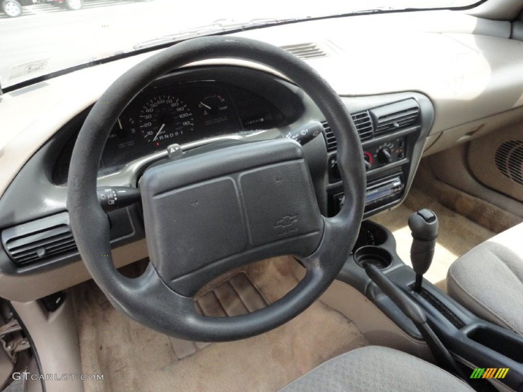 1996 Chevrolet Cavalier Sedan Beige Steering Wheel Photo #51487276