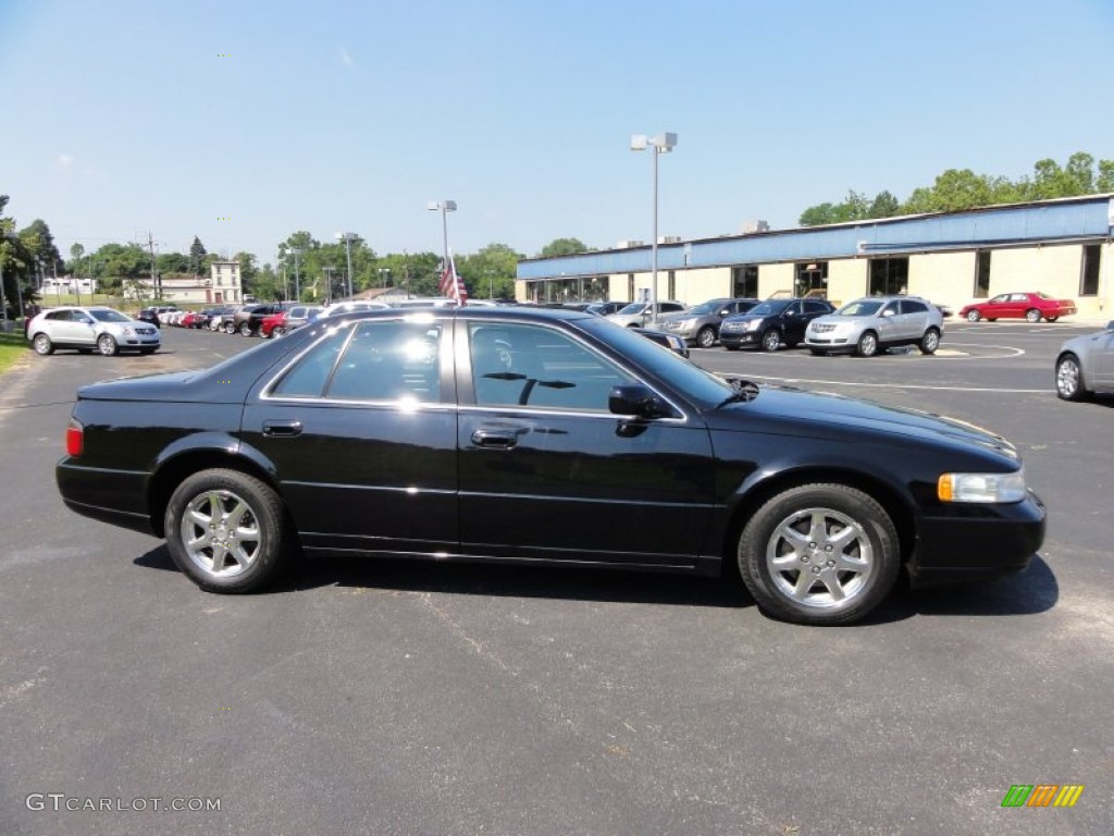 Black Raven 2004 Cadillac Seville SLS Exterior Photo #51546282