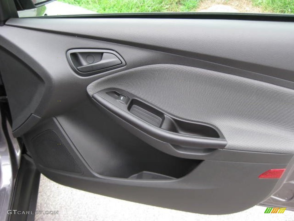 2012 Ford Focus S Sedan Charcoal Black Door Panel Photo #51572836