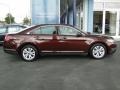 2010 Cinnamon Red Metallic Ford Taurus SEL  photo #11