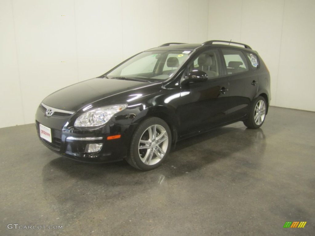 2010 Elantra Touring SE - Ebony Black / Beige photo #1