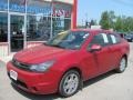 2009 Sangria Red Metallic Ford Focus SE Coupe  photo #1