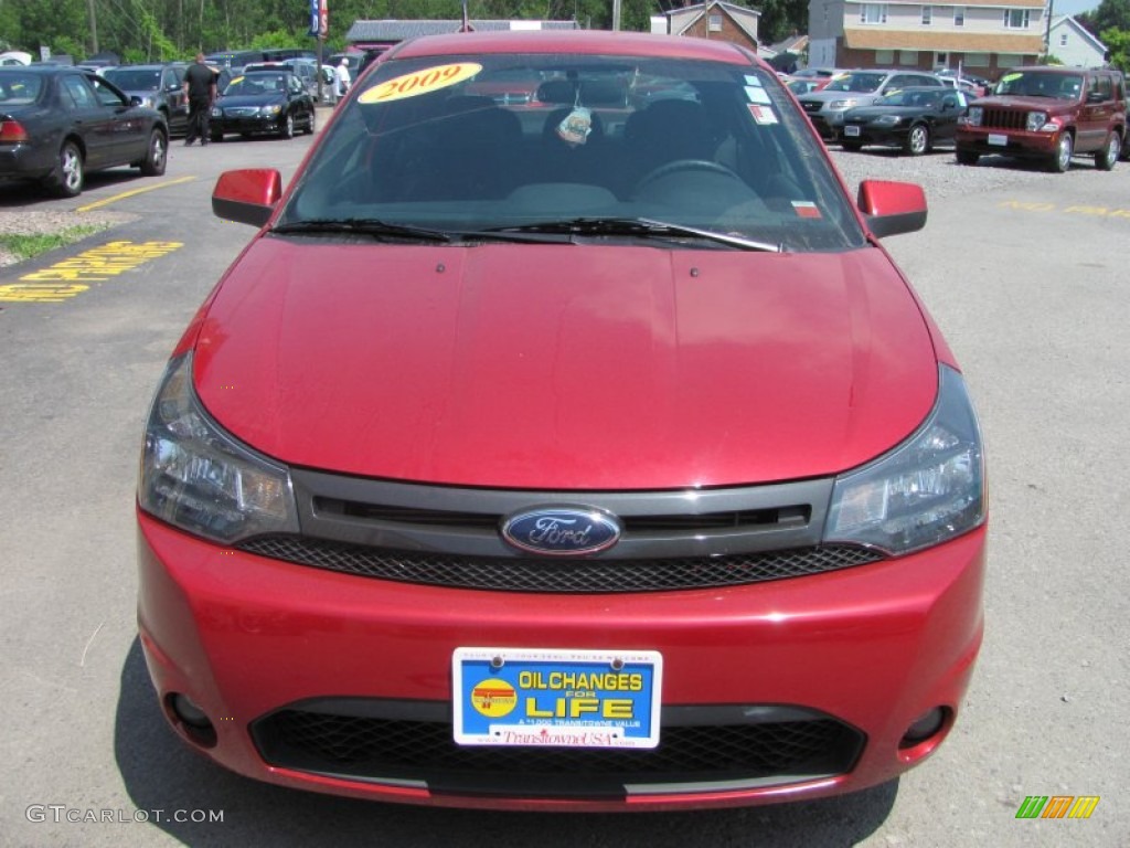 2009 Focus SE Coupe - Sangria Red Metallic / Medium Stone photo #16