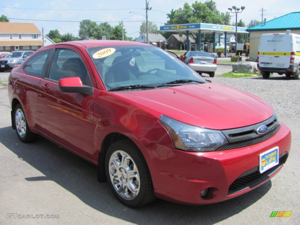 2009 Focus SE Coupe - Sangria Red Metallic / Medium Stone photo #17