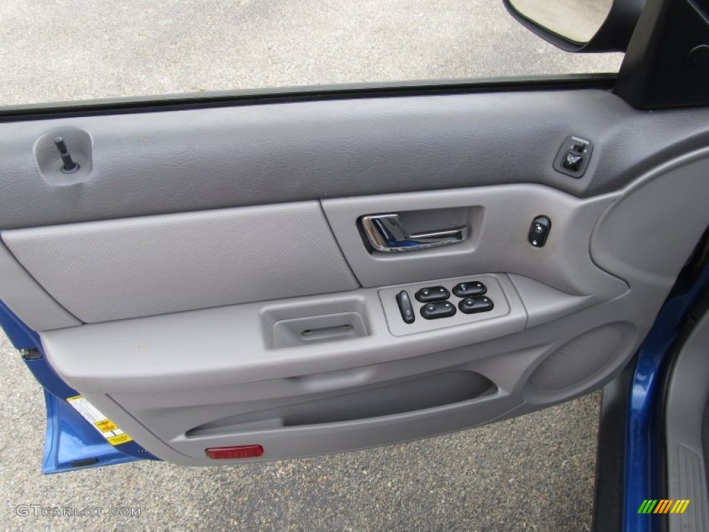 2003 Ford Taurus SE Medium Graphite Door Panel Photo #51679785