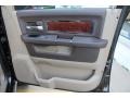 Light Pebble Beige/Bark Brown Door Panel Photo for 2010 Dodge Ram 3500 #51700612