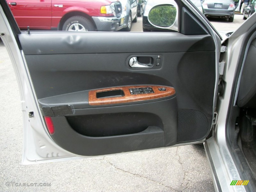 2005 Buick LaCrosse CXS Ebony Door Panel Photo #51711421
