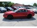 2002 Laser Red Metallic Ford Mustang V6 Coupe  photo #4