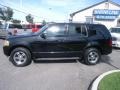 2003 Black Ford Explorer Limited 4x4  photo #2