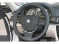 Oyster/Black Steering Wheel Photo for 2012 BMW 7 Series #51767773