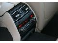 Oyster/Black Controls Photo for 2012 BMW 7 Series #51767881