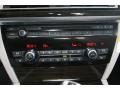 Oyster/Black Controls Photo for 2012 BMW 7 Series #51767947