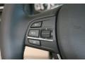 Oyster/Black Controls Photo for 2012 BMW 7 Series #51768111