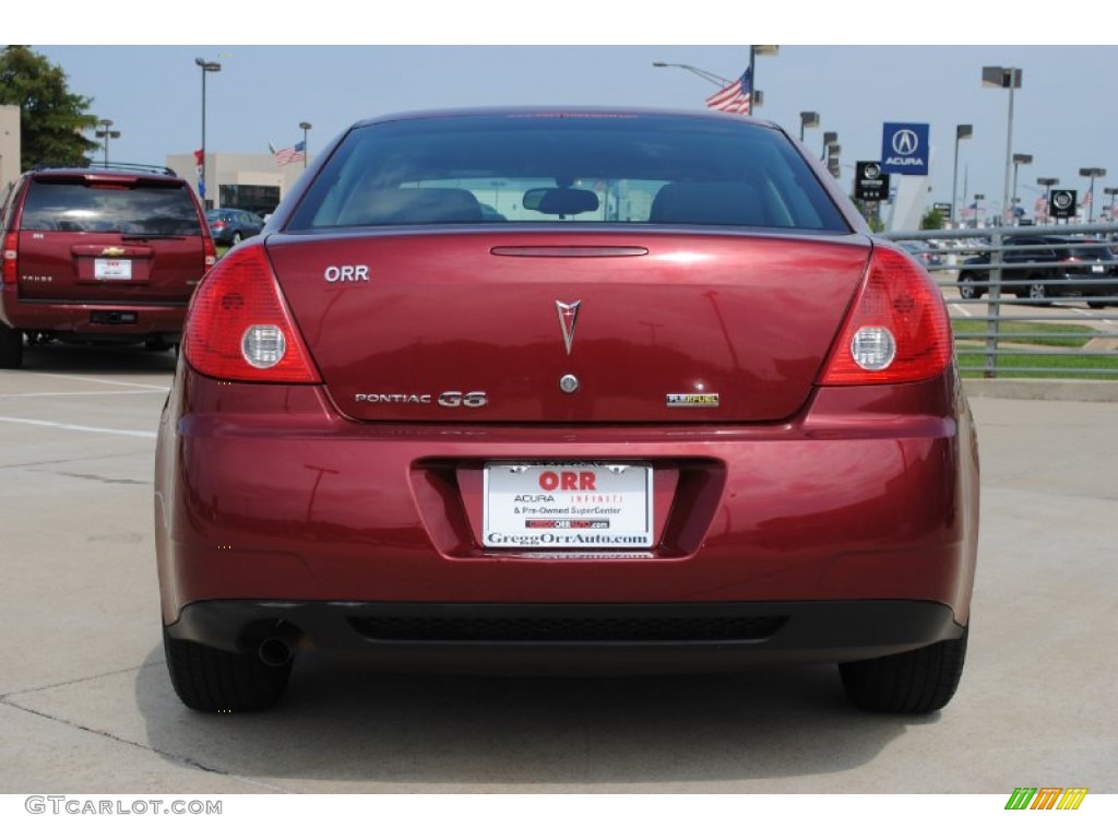 2010 G6 Sedan - Performance Red Metallic / Ebony photo #6