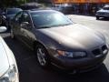 1999 Dark Bronzemist Metallic Pontiac Grand Prix GT Sedan  photo #1