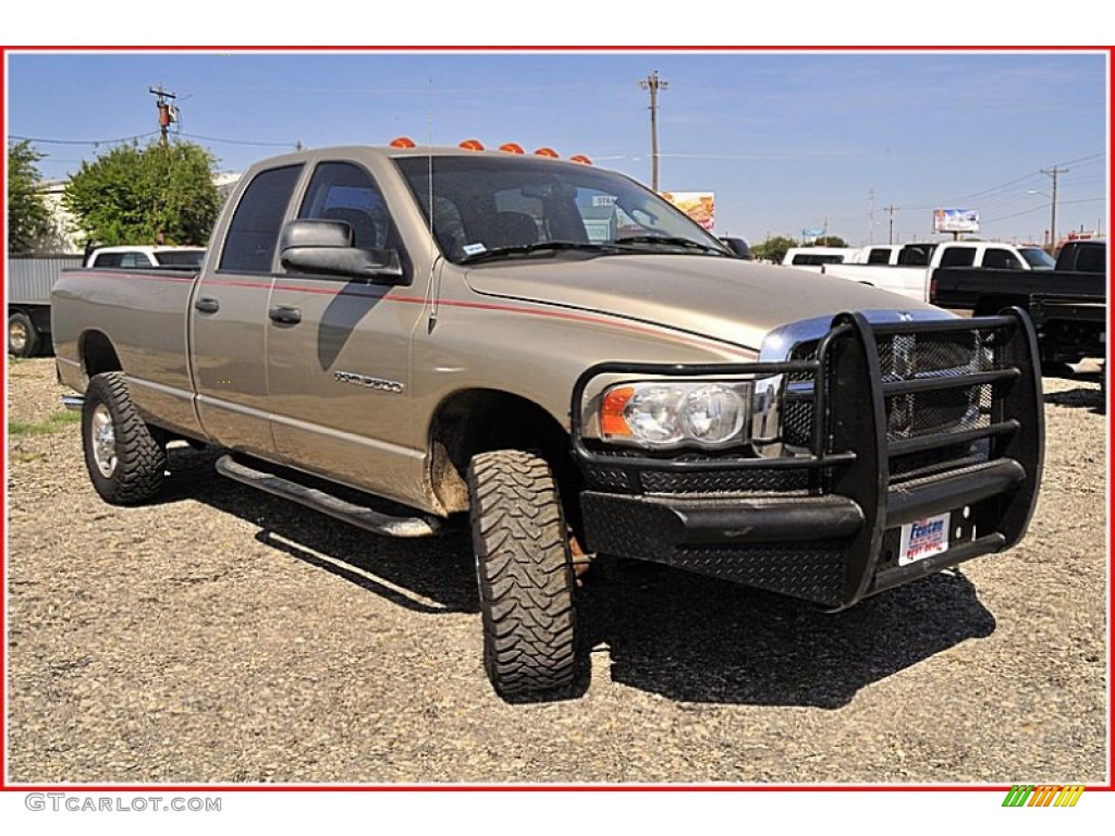 2004 Ram 3500 SLT Quad Cab 4x4 - Light Almond Pearl Metallic / Taupe photo #10